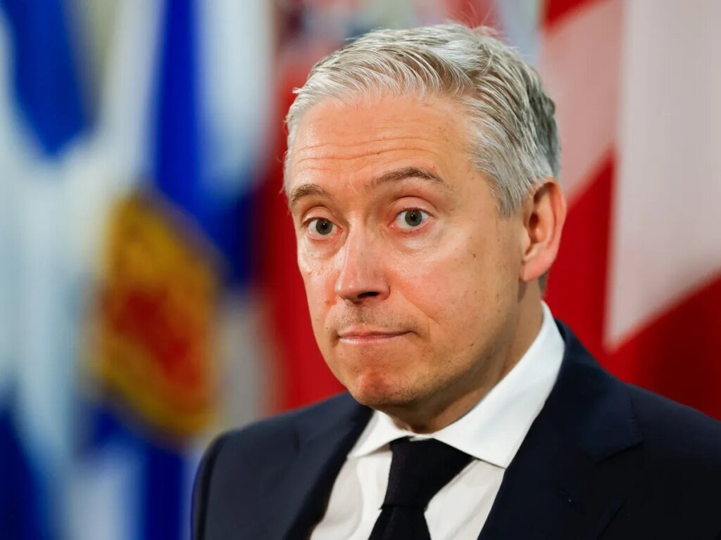 Ottawa to pay for big spending with bigger deficits, growth: Champagne