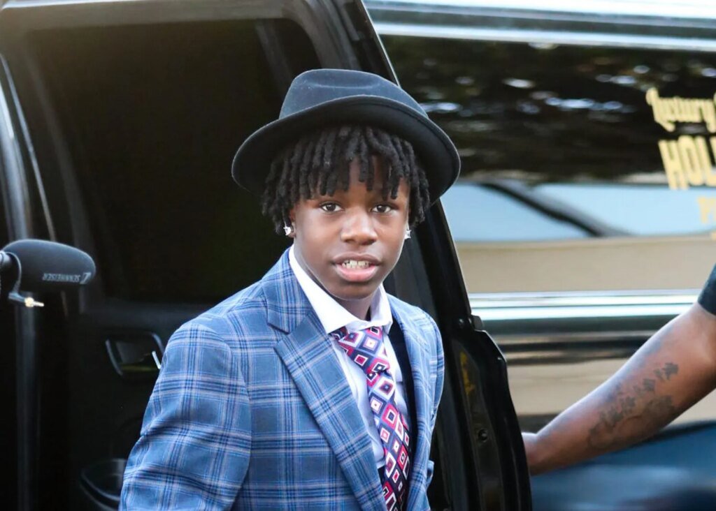 Rakai Goes Viral After Calling 911 Over Haircut Mishap (VIDEOS)