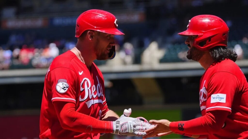 Reds homer 4 times to clinch series win over Rockies Reds homer 4 times to clinch series win over Rockies