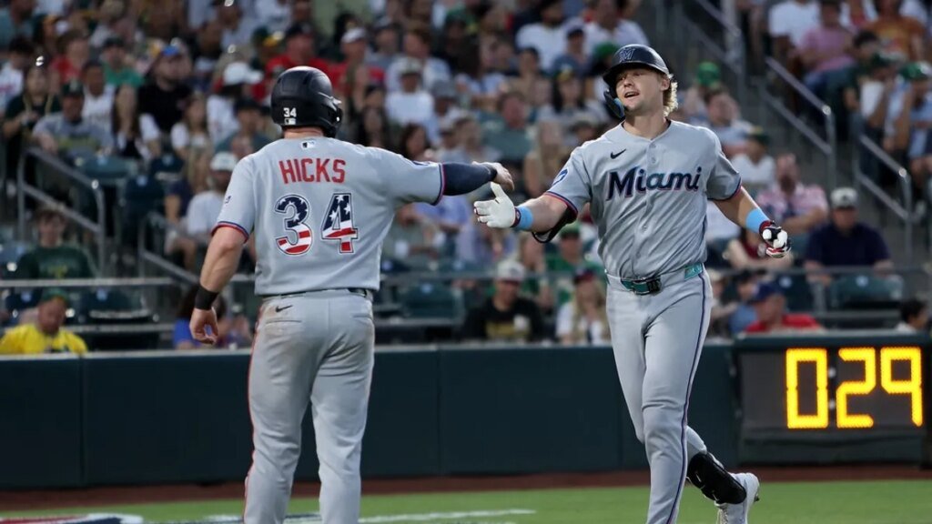 Riding power surge, Marlins bid for sweep of spiraling A's