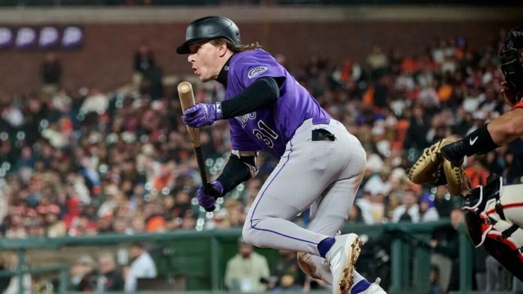Rockies awaken in 9th, rally past Giants