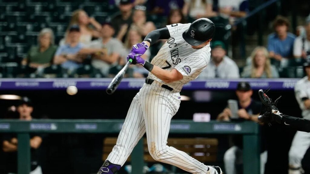 TJ Rumfield drives in four to lift Rockies past Reds TJ Rumfield drives in four to lift Rockies past Reds
