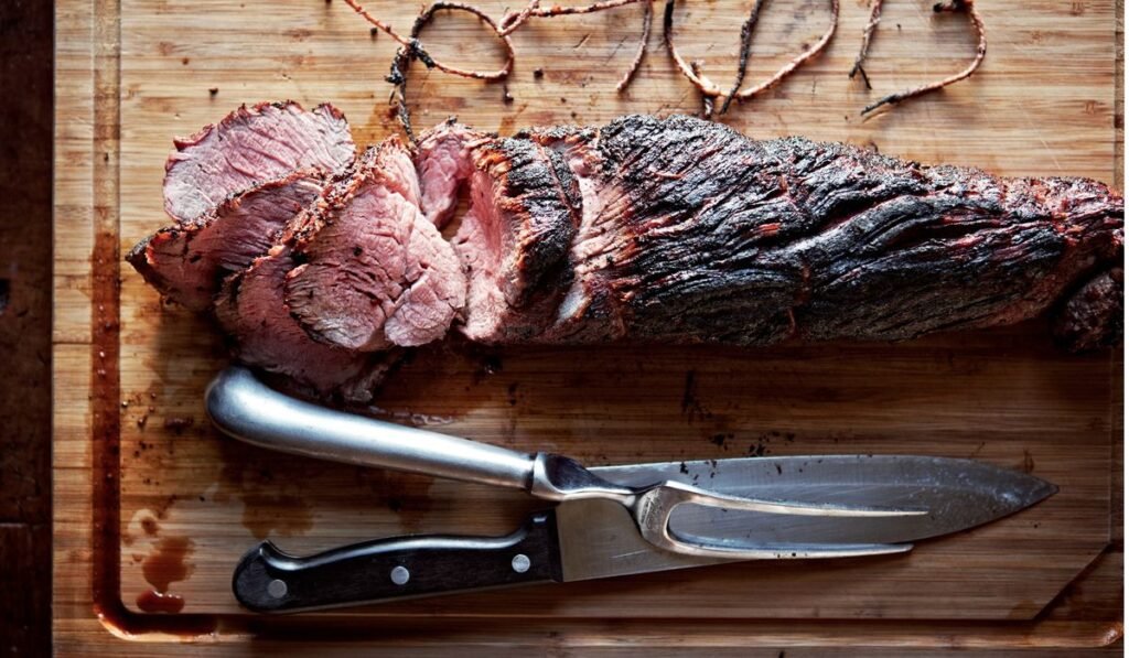 This smoky, fire-kissed beef tenderloin with herb butter comes from Canal House This smoky, fire-kissed beef tenderloin with herb butter comes from Canal House