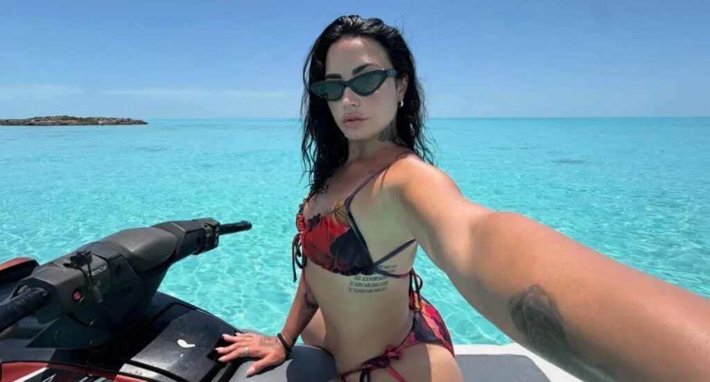 Demi Lovato Flaunts Curves in a Thong Bikini While Jet-Skiing Demi Lovato Flaunts Curves in a Thong Bikini While Jet-Skiing