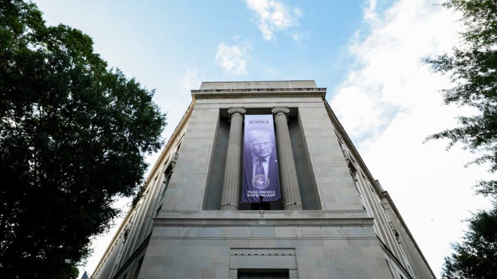 Former federal prosecutor sues DOJ for 'unlawful and retaliatory' firing : NPR