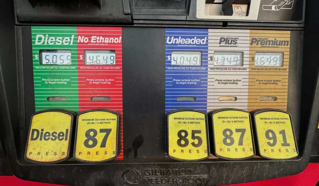 Inflation cooled last month as gas prices fell, though costs remain elevated