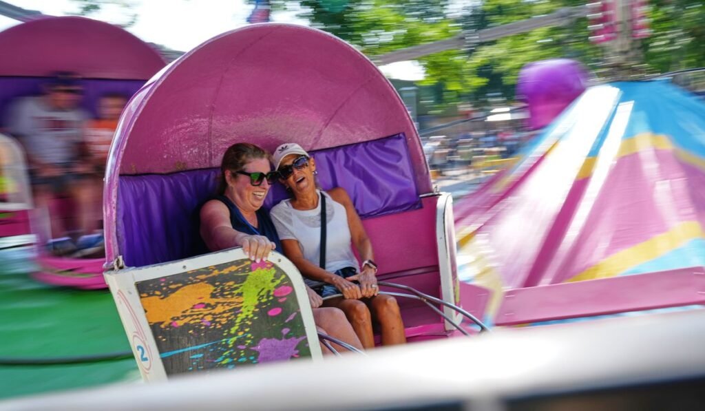 Spinning and dipping, Minnesota fairgoers delight in the classic Tilt-A-Whirl ride as it turns 100 Spinning and dipping, Minnesota fairgoers delight in the classic Tilt-A-Whirl ride as it turns 100
